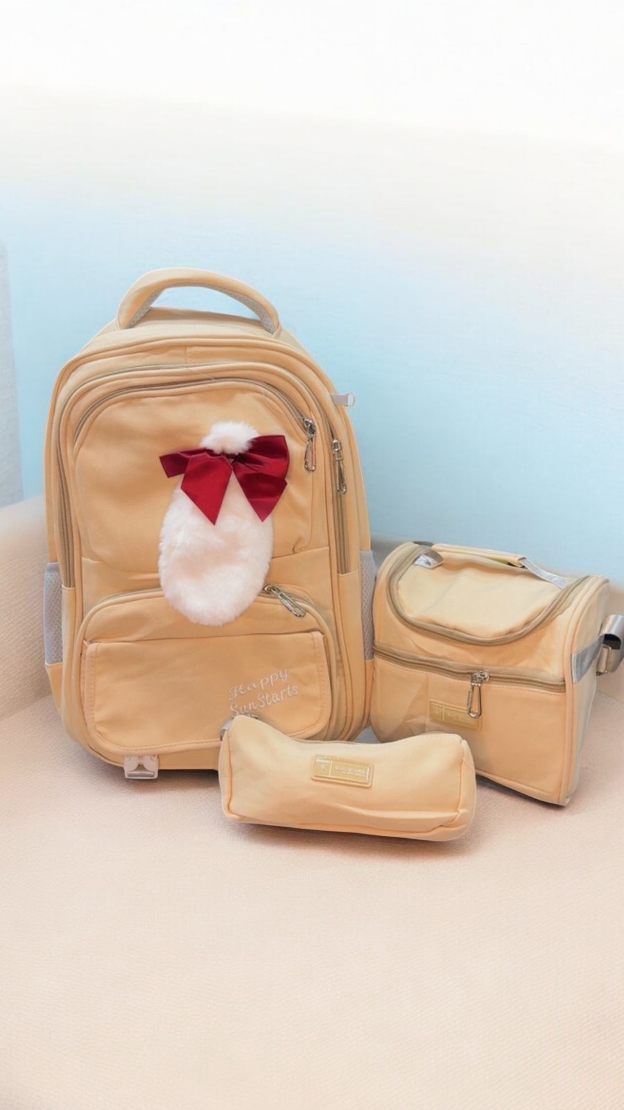 Combo mochila, cartuchera y lonchera marrón