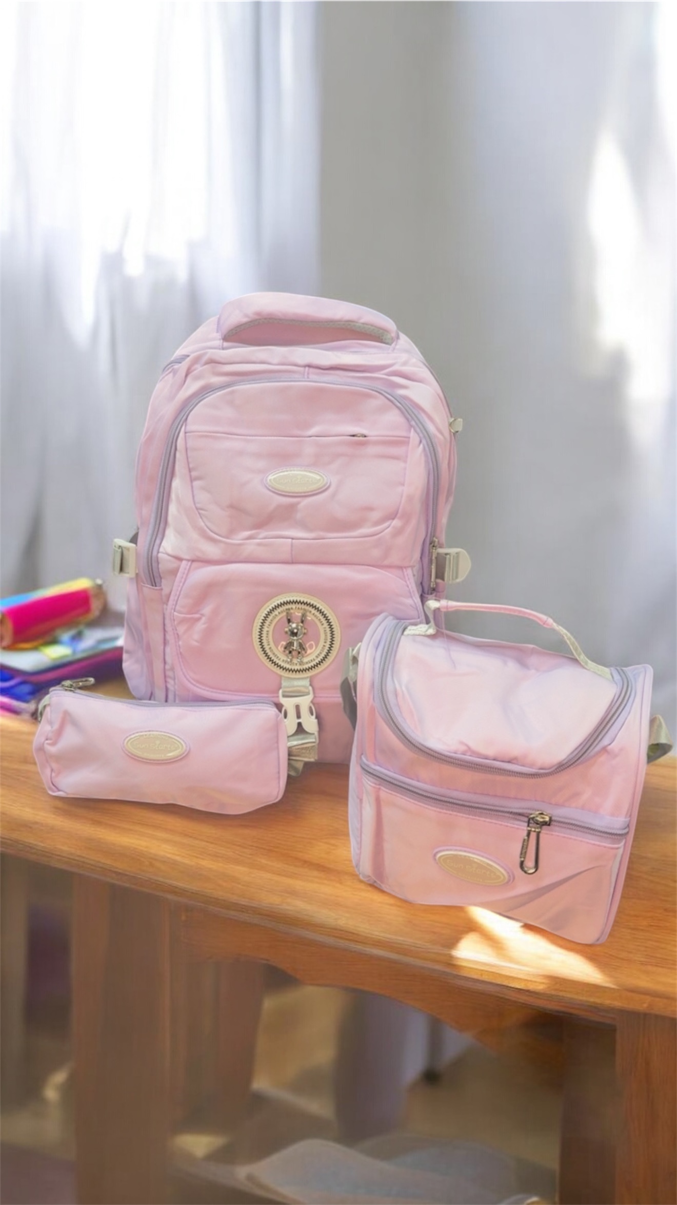 Combo mochila, cartuchera y lonchera lila
