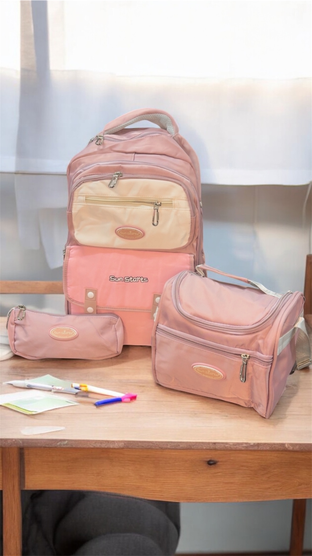 Combo mochila, cartuchera y lonchera rosa